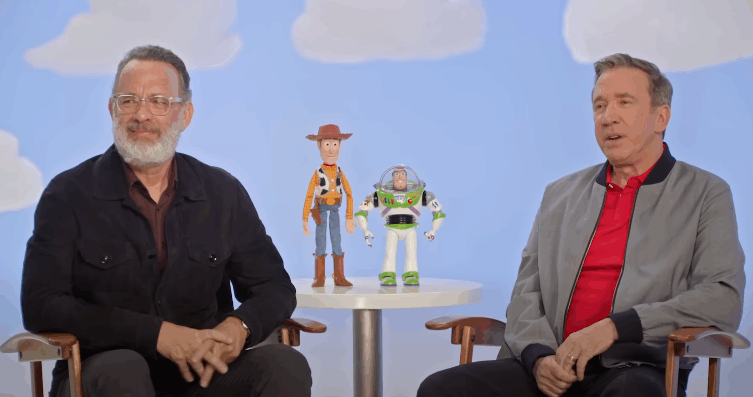 Tom Hanks and TIm Allen with Woody and Buzz