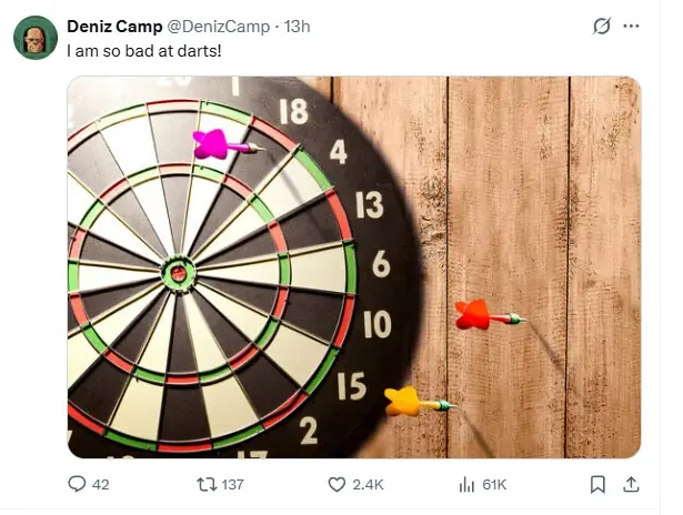 Screenshot of an X post feature a dartboard and missed shots