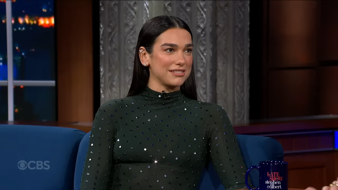 (1) What Time Does Dua Lipa Go To Sleep After A Show 00-01-13 Dua Lipa smiling during an interview