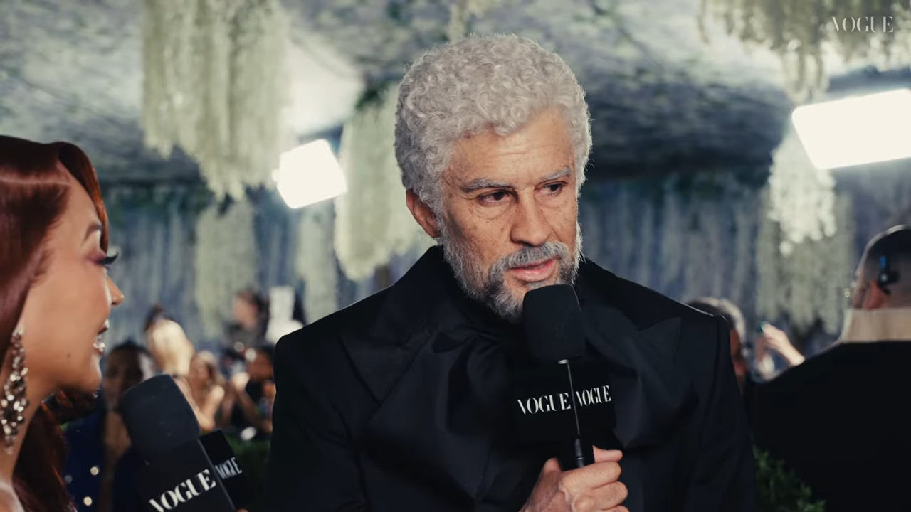 A young man made up to look like an old man for a red carpet interview
