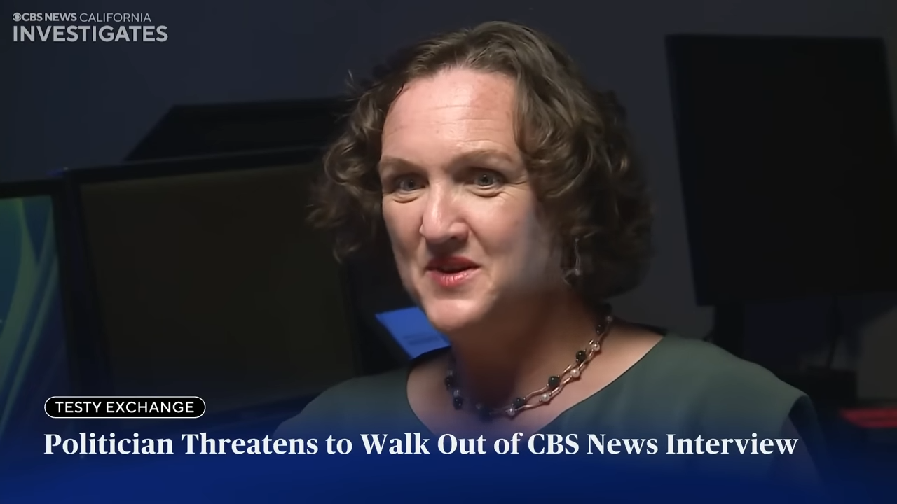 A woman speaks in an interview