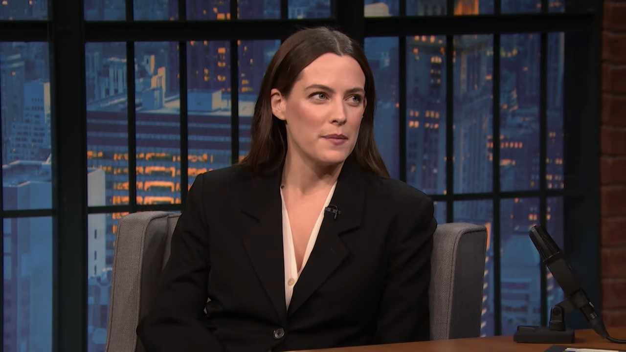 Riley Keough looking to the side as she speaks