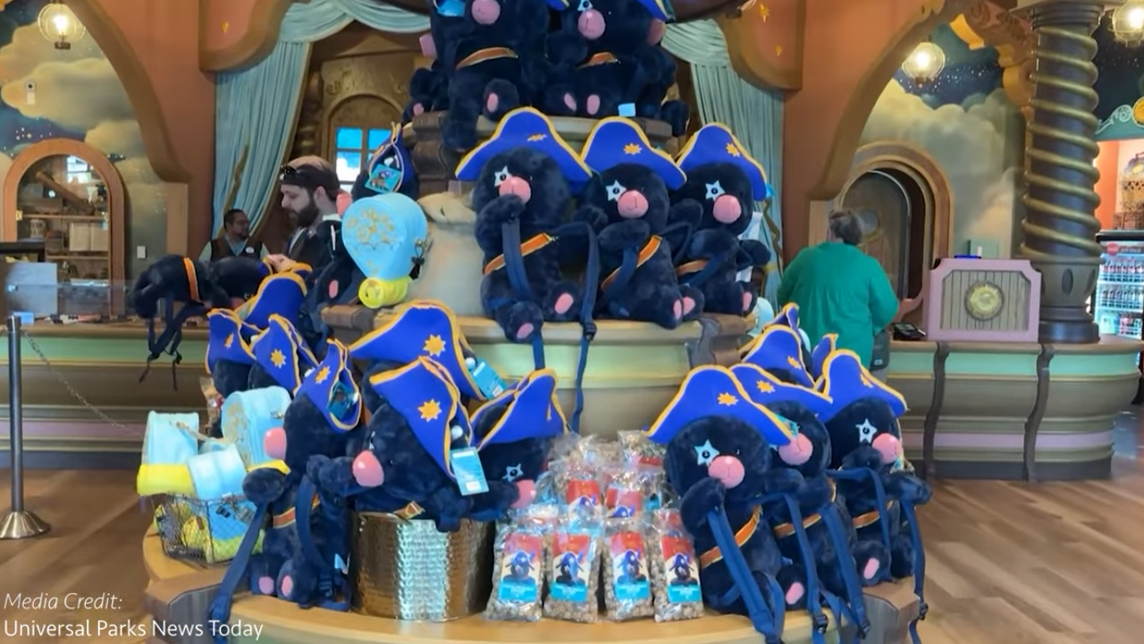 A display of Captain Cacao plushes and other merchandise at Epic Universe