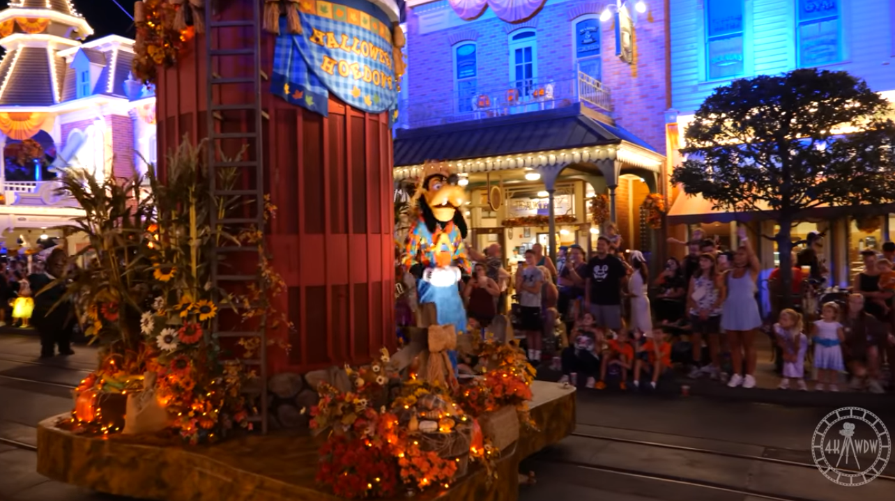 Goofy Dressed as a Scarecrow on a fall-themed float in the Boo-to-You Parade at Magic Kingdom