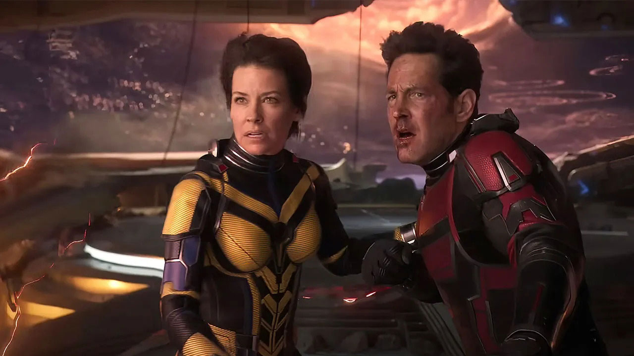 The Wasp and Ant-Man in costume look in awe at something off screen