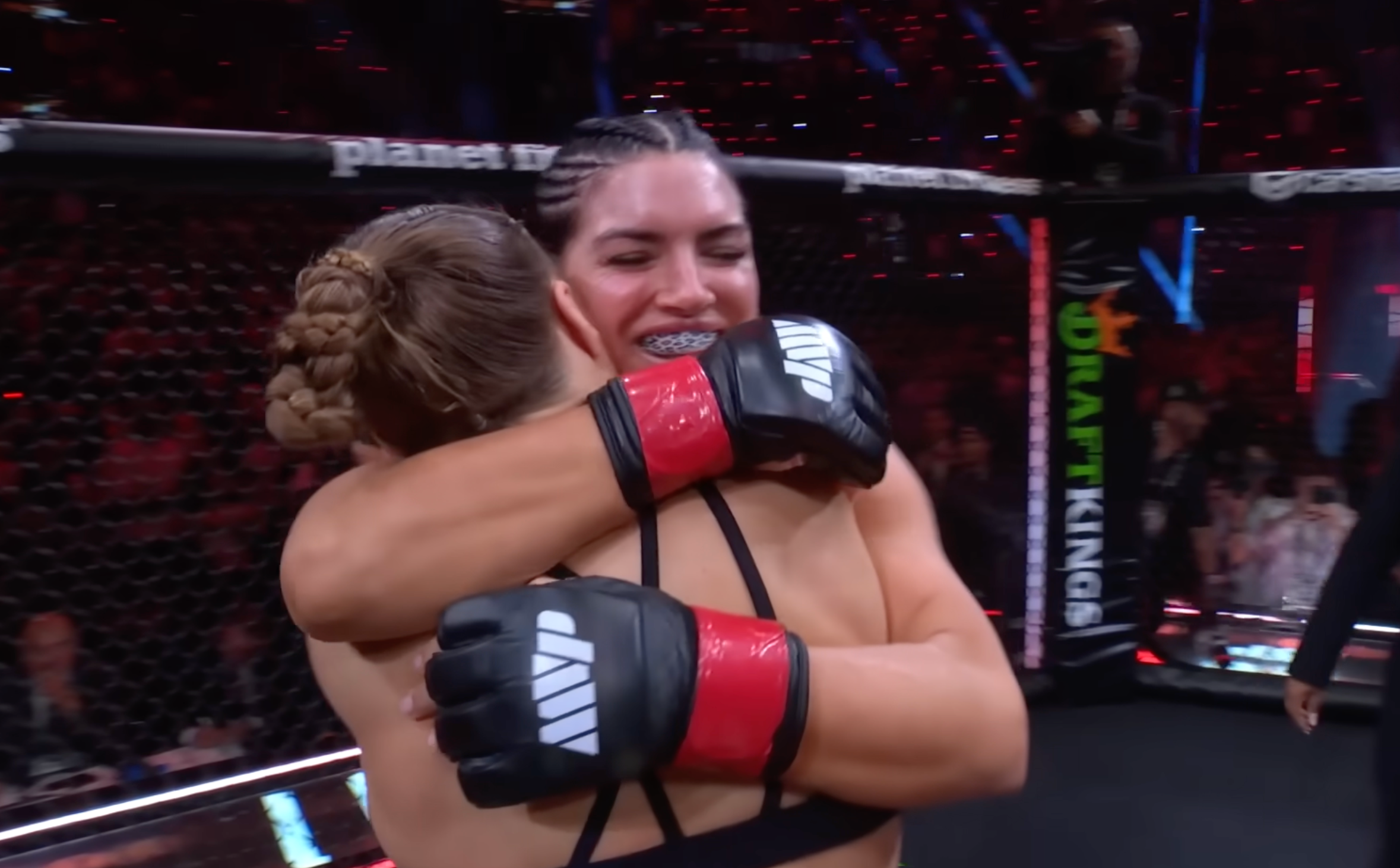 Ronda Rousey and Gina Carano embrace after their Netflix fight