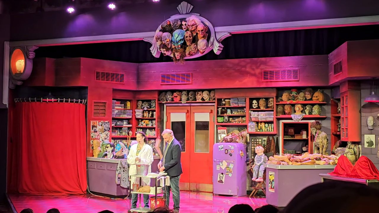 Stage performance of the Universal Horror Make-up Show, with two performers on-stage