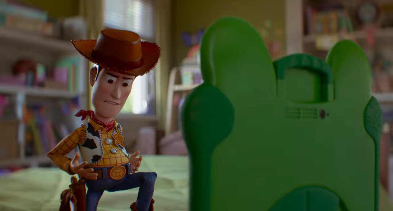 Woody from Toy Story looking at his stomach