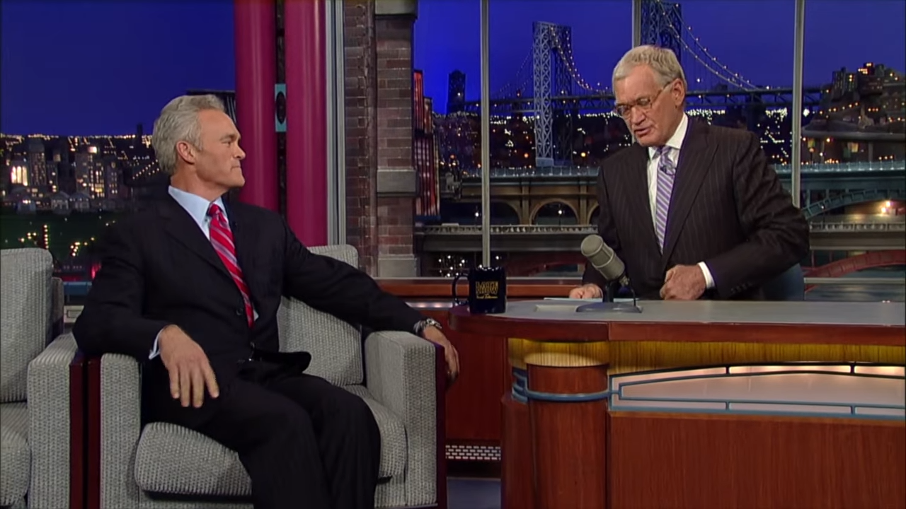 A guest and host on a late-night interview