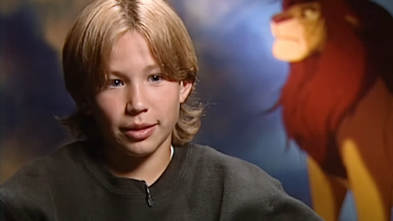 A young boy sits for an interview