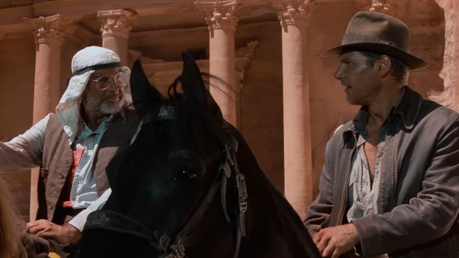 Men on horseback, one making an invitation to move on