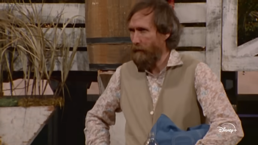 (493) Jim Henson Idea Man Official Trailer Disney+ 00-01-28 Jim Henson seated for an interview on a rural TV set