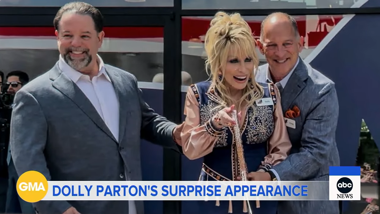 Dolly Parton at a ribbon-cutting ceremony