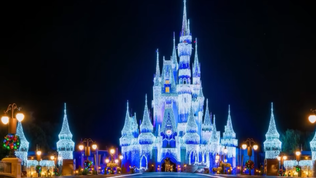 Cinderella Castle with lights along the roofs, appearing as ice along the castle