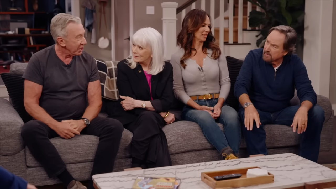 Four adults on a couch