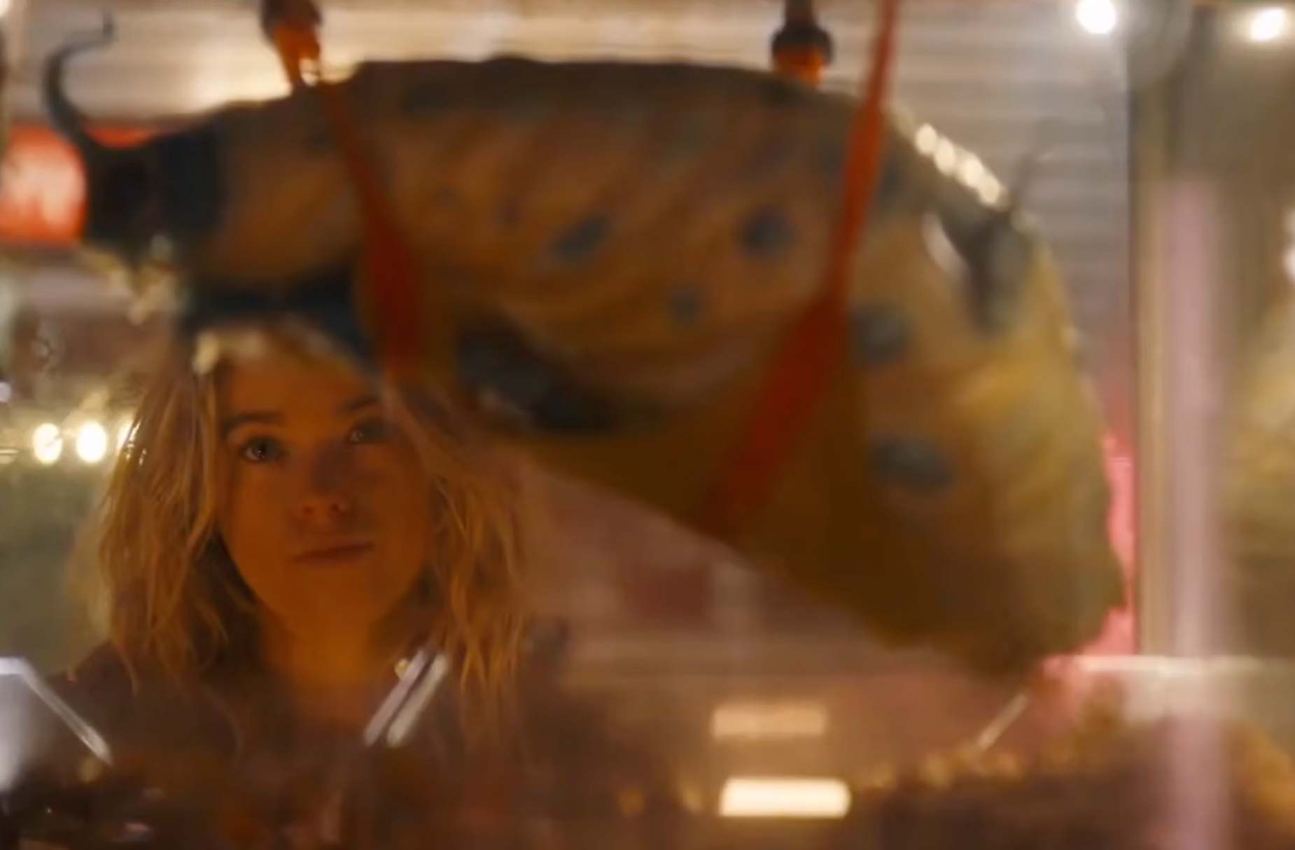 Supergirl and an alien slug