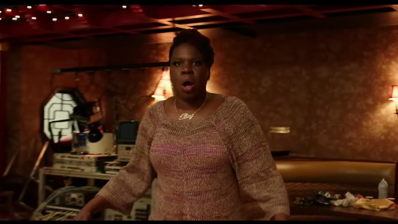 A black woman looks shocked and appalled