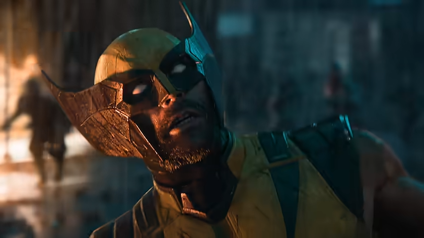 Video game image of Wolverine in profile, looking up during a battle