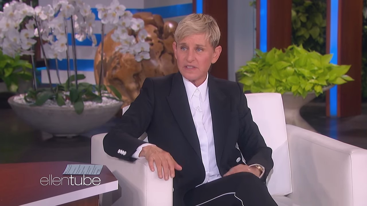 A woman sits on the set of a daytime talk show