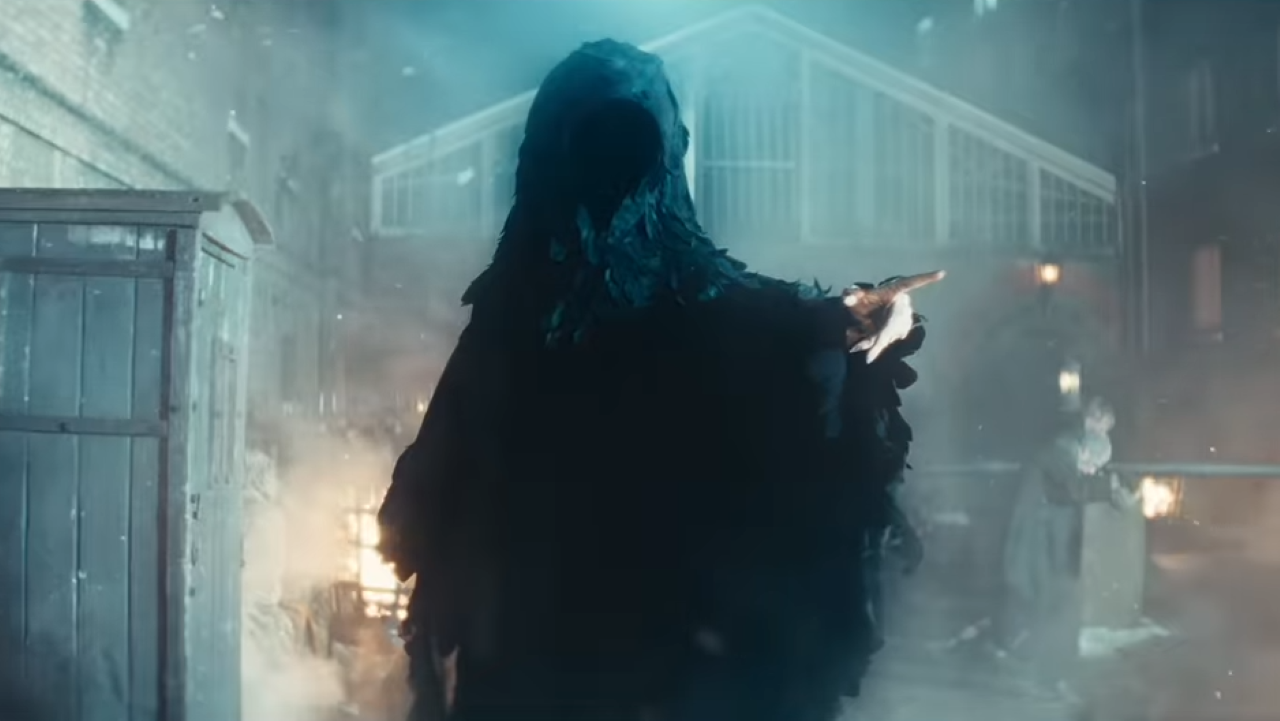 A hooded supernatural figure