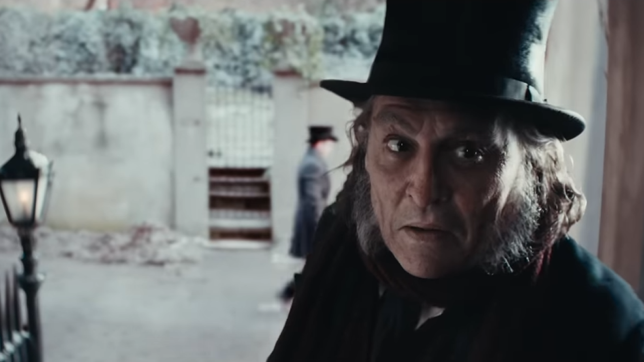 Johnny Depp Ebenezer An old man in Victorian clothing half-smiles