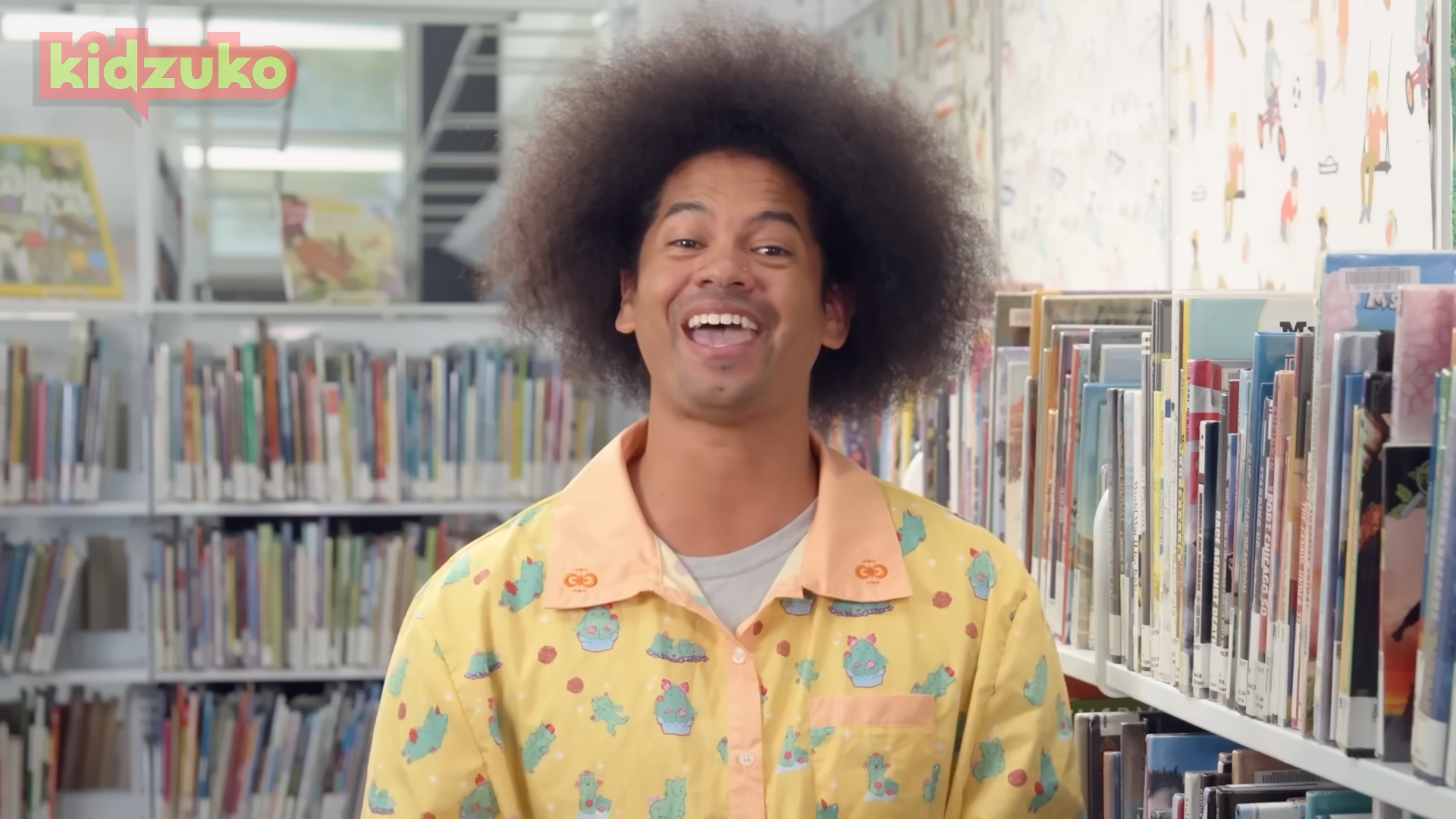 Mychal Threets in a library