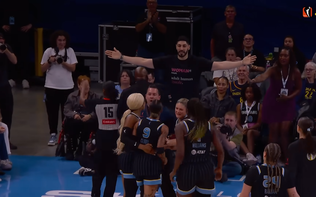 Former NBA Player Enes Kanter Ejected From WNBA Game for Wearing Shirt Defining The Word “Woman”
