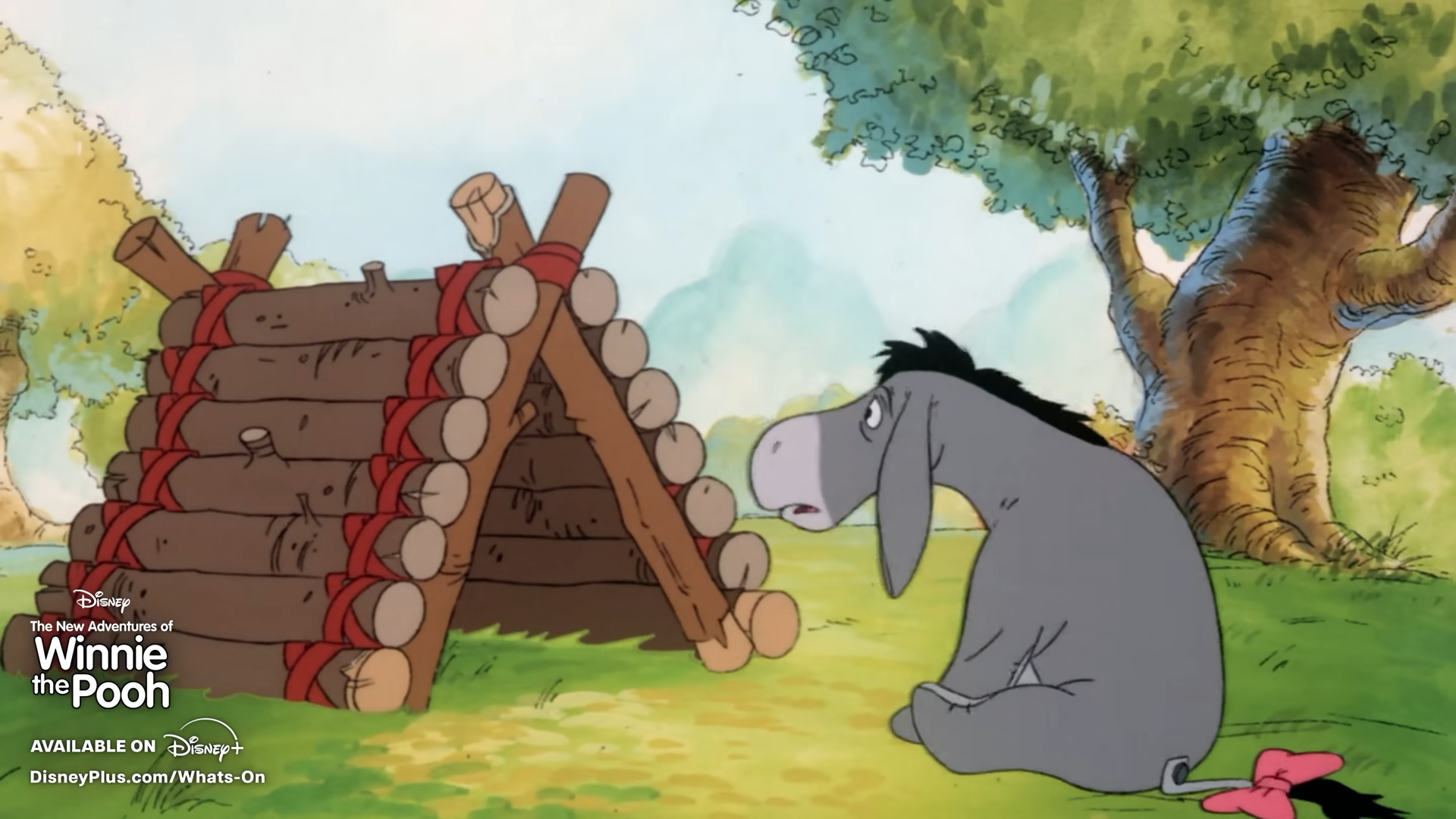 Eeyore looks sadly at a wooden tent
