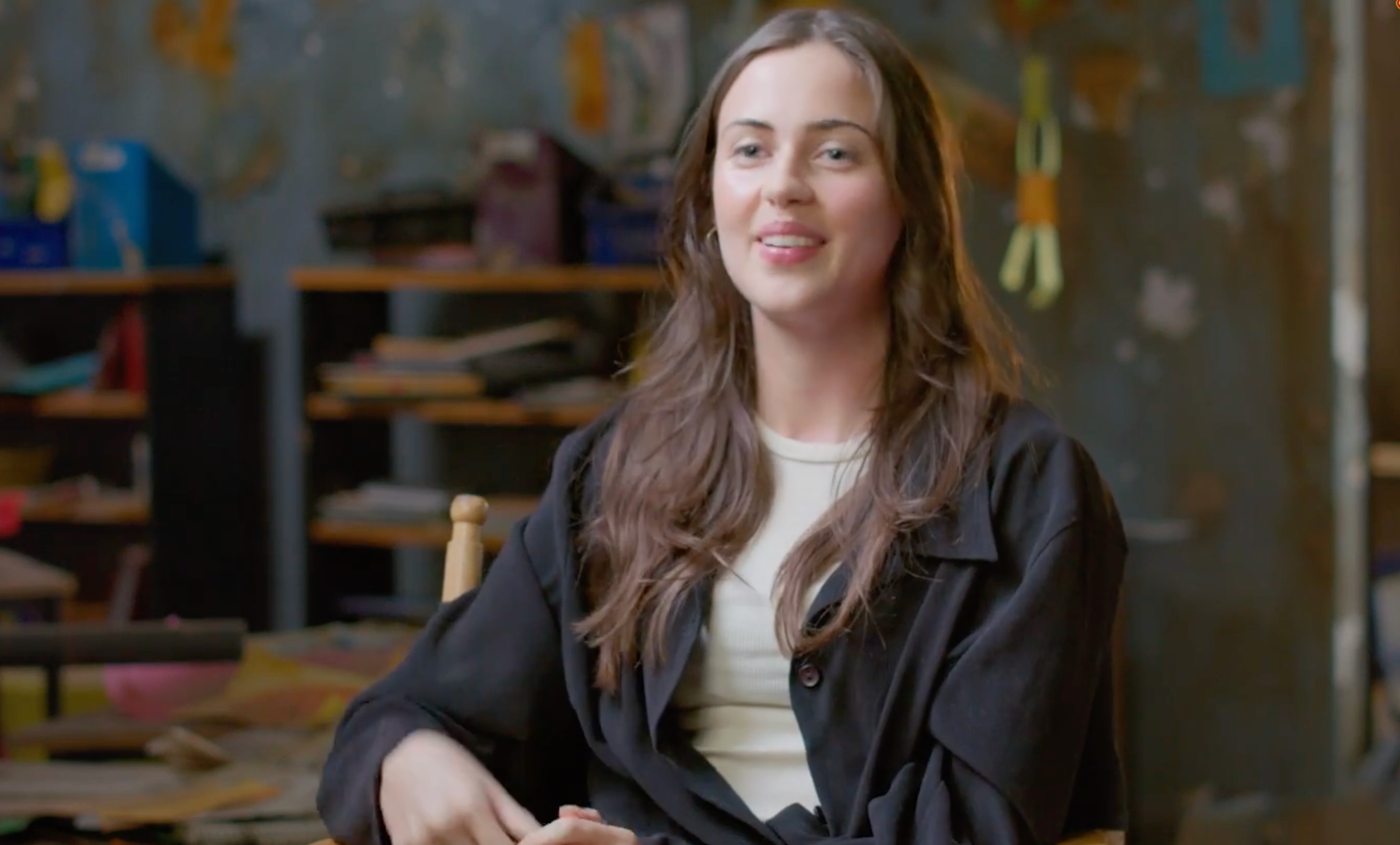 Lydia Peckham smiling in an interview