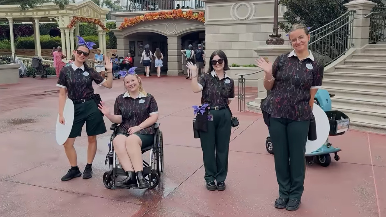New Cast Member Costumes at Mickeys Not-So-Scary Halloween Party Line of four women in dark uniform