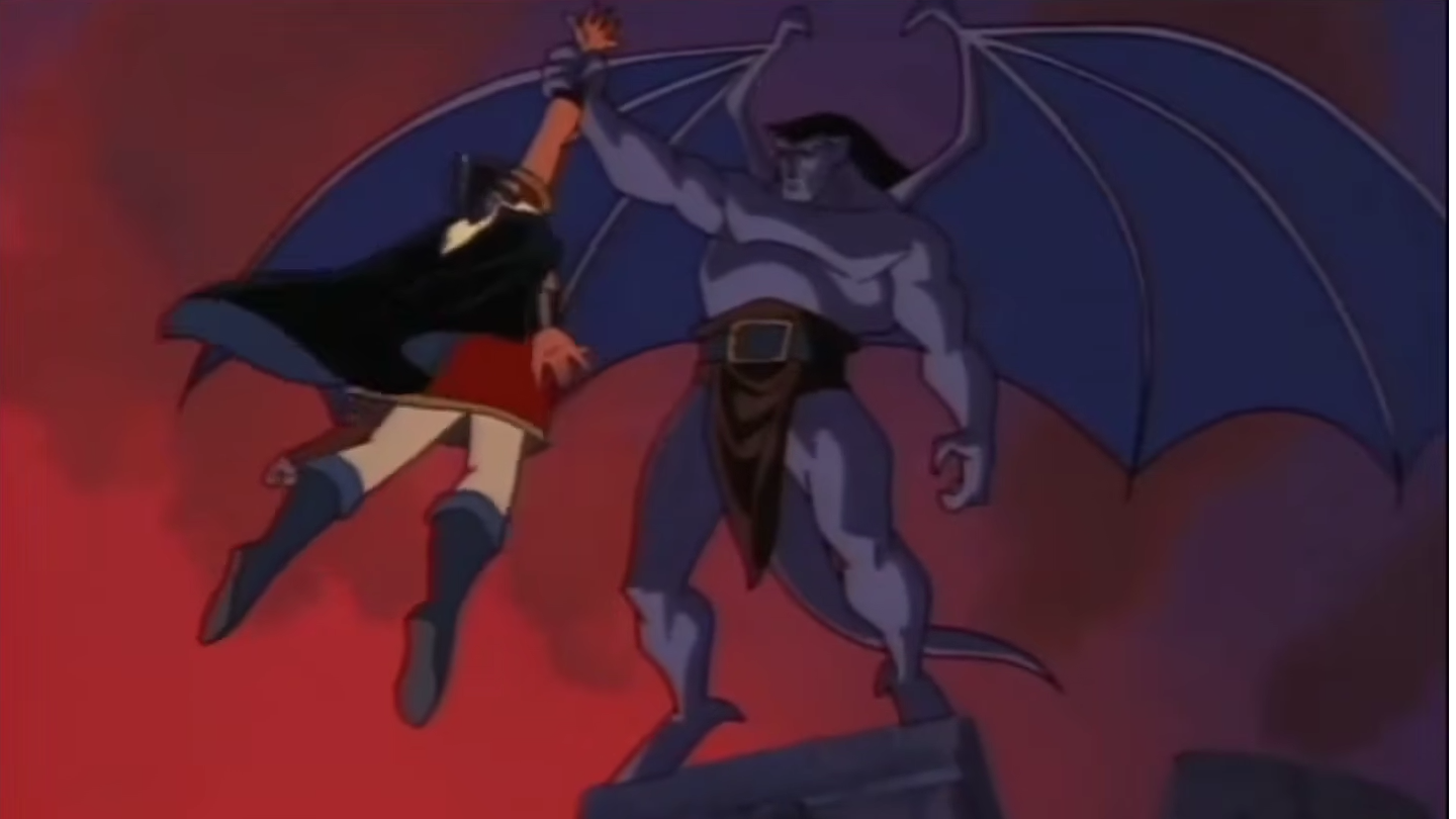 An animated gargoyle holds a man in one hand