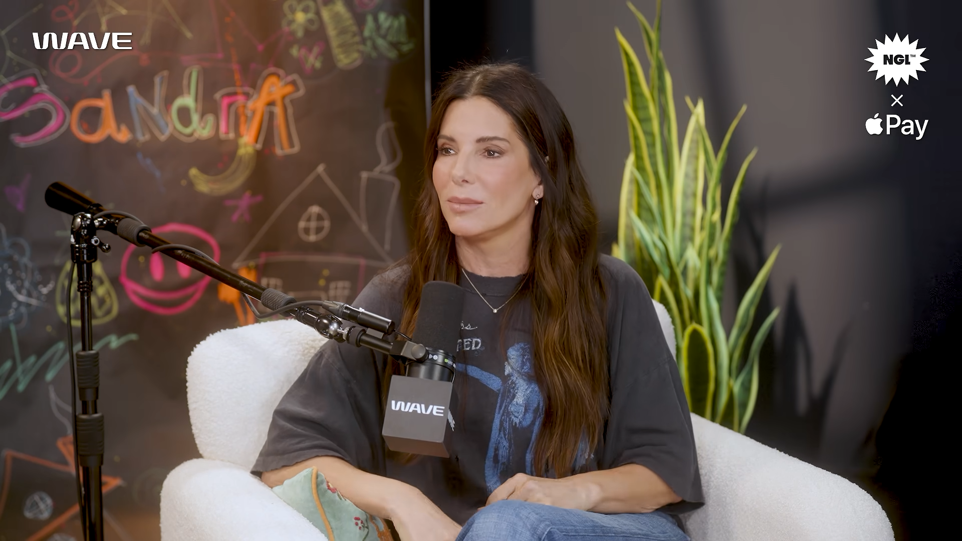Sandra Bullock seated for a podcast interview