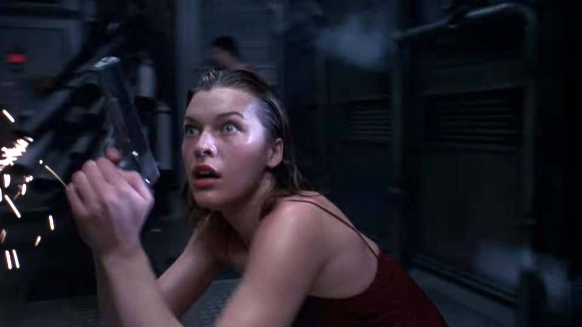 A frightened woman holding a gun