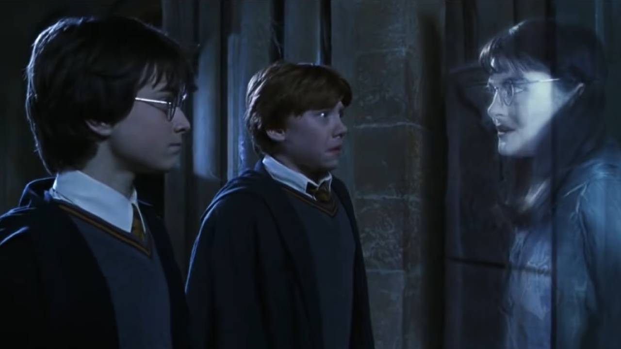 Harry and Ron are nervous as the ghost of Moaning Myrtle stands in front of them