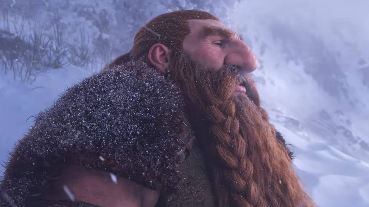 Video game image of a man with a long, braided beard in a snowy landscape, at peace