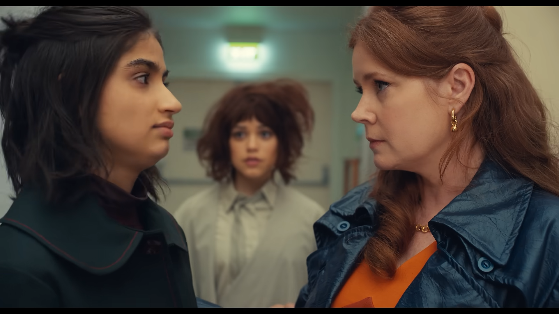 A mother and daughter facing off