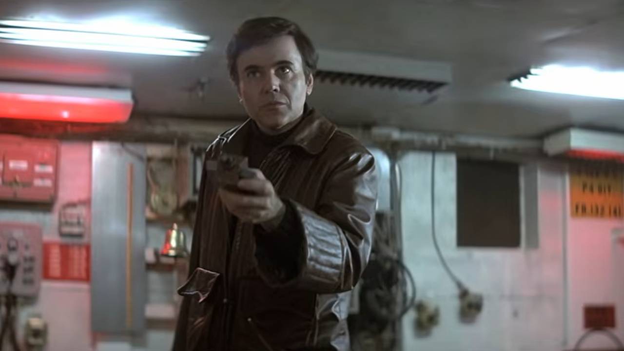 Chekov holds a phaser
