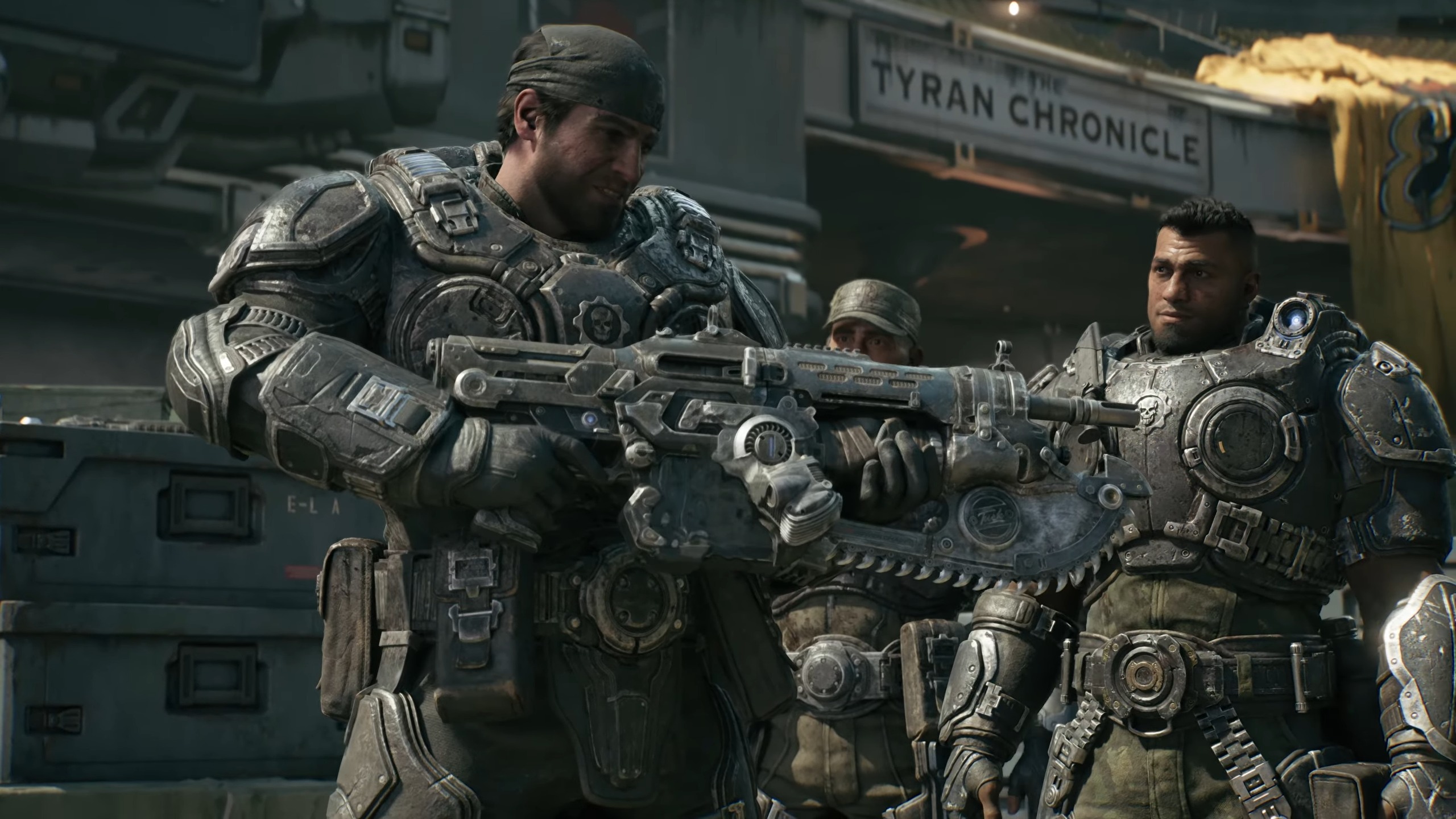 A video game soldier in mech armor holds a massive machine gun