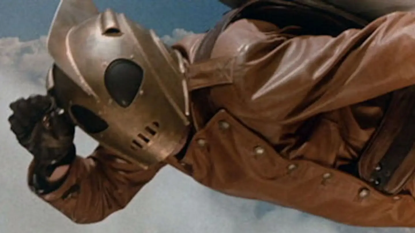 The Rocketeer flying and saluting