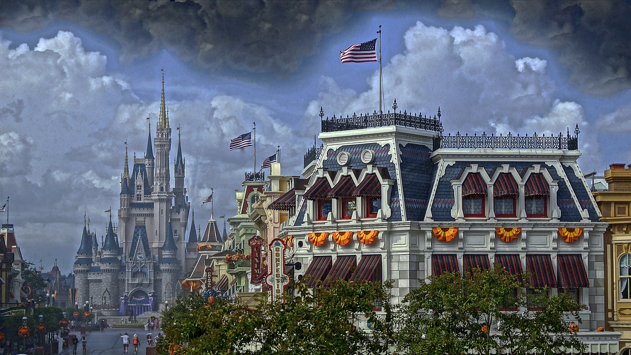 Guests walking in rain on Main Street U.S.A. at Magic Kingdom
