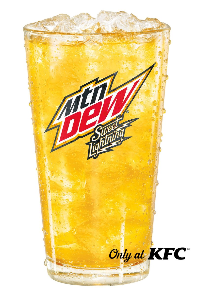 A glass of golden soda with the Mtn Dew Sweet Lightning logo and the words Only at KFC