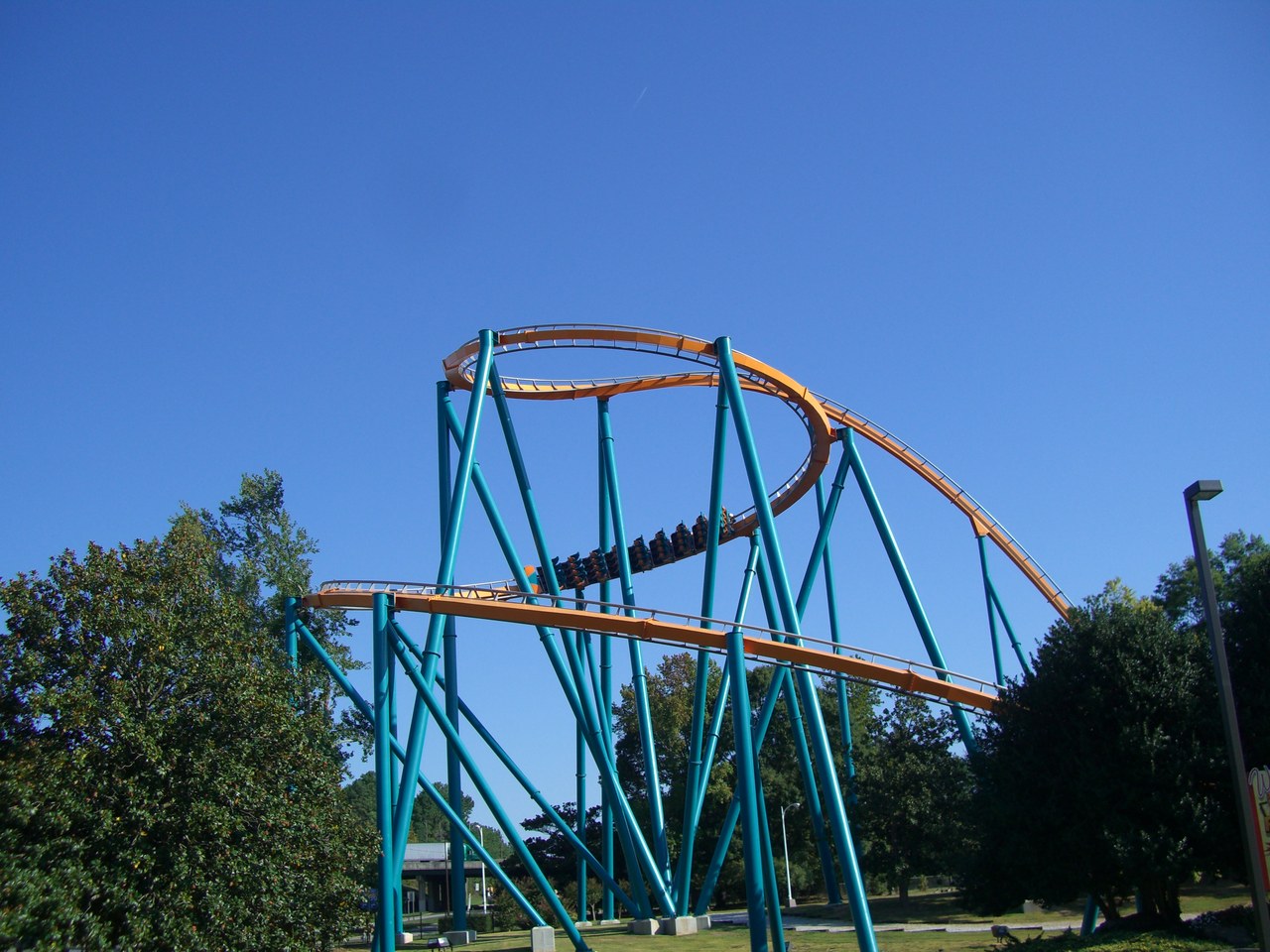 Goliath's track and support columns at Six Flags Over Georgia under a blue sky