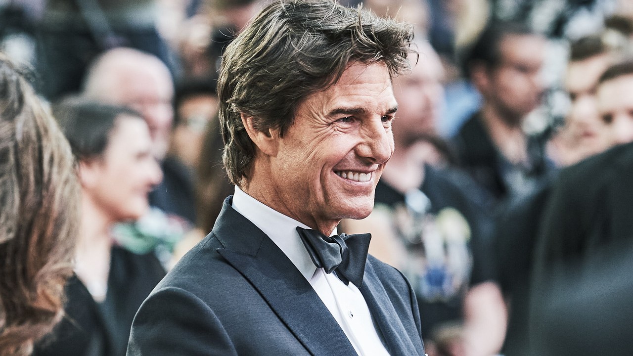 Tom Cruise Will Receive the 52nd AFI Life Achievement Award Tom Cruise smiling at a 2022 movie premiere in London